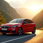 Peugeot 308 GTI rouge sur route de montagne en fin de journée